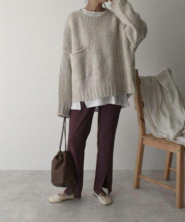 Übergroßer elfenbeinfarbener Pullover mit Vordertasche